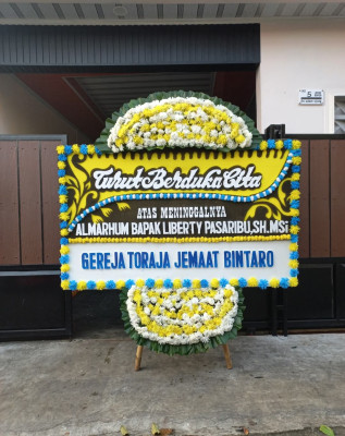 Papan Bunga Duka di Hirit